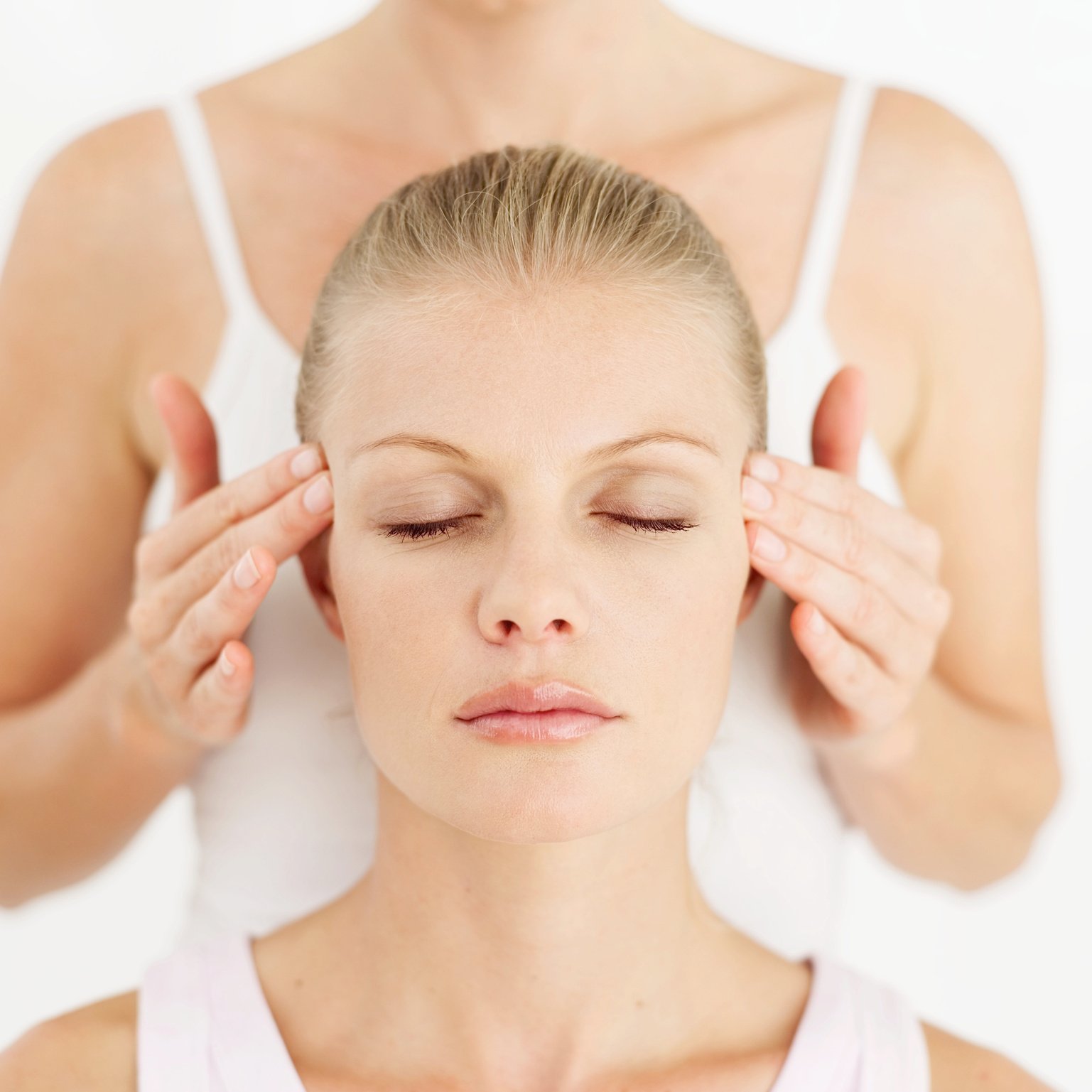 Woman getting a head massage